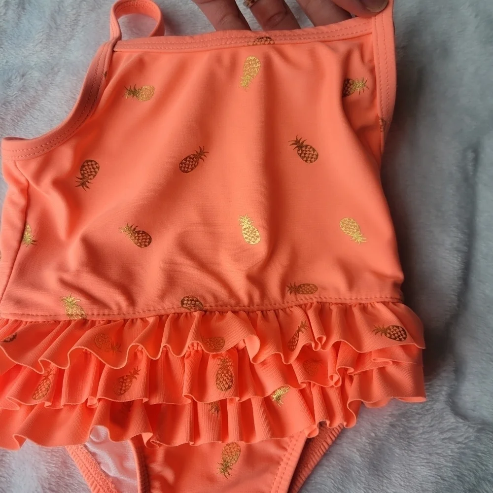 The children's place pineapple one piece ruffle baby swim suit 9-12 months